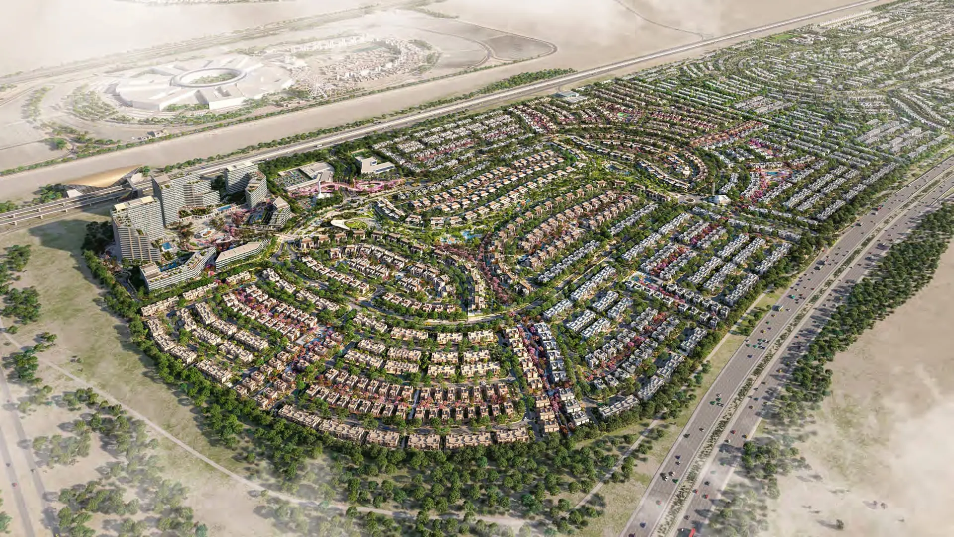 Daytime aerial of the Greenwoods by Aldar master community in Dubai Silicon Oasis, with landscaped villa streets and apartment buildings.